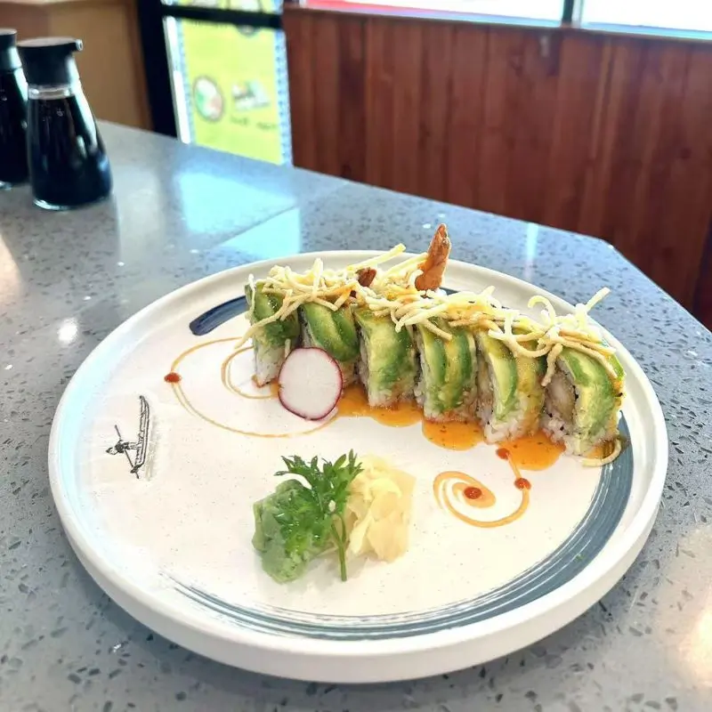 Creamy avocado-wrapped roll with tempura shrimp at Hokkaido Ramen Sushi, a Japanese Restaurant in Lewisville